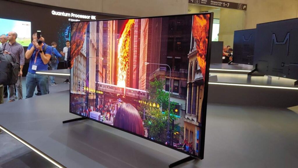 Thomson 43-inch QLED 4K Smart TV with bezel-less metallic design in a modern living room