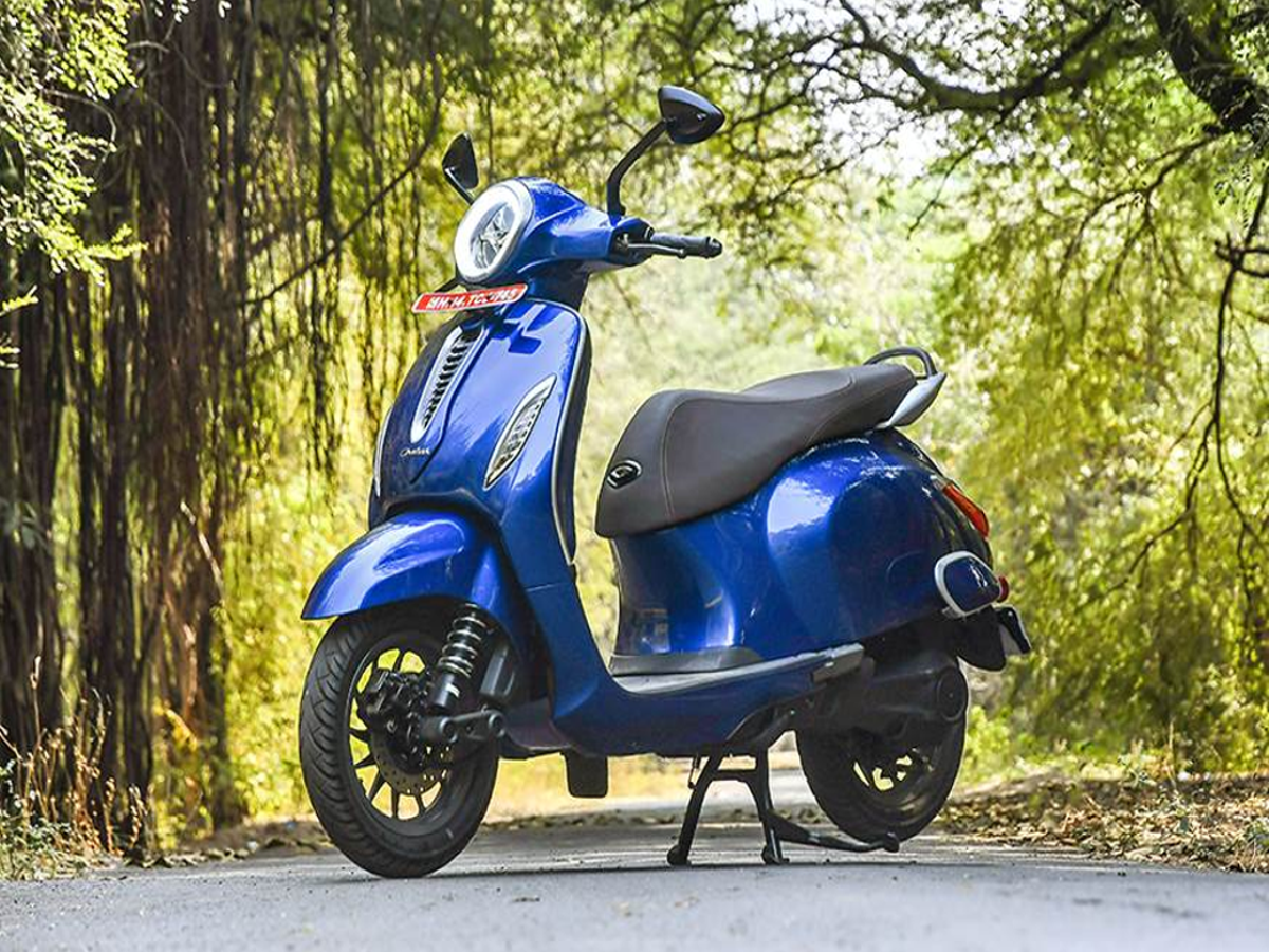 Bajaj Chetak Urbane electric scooter with classic design in a city environment.