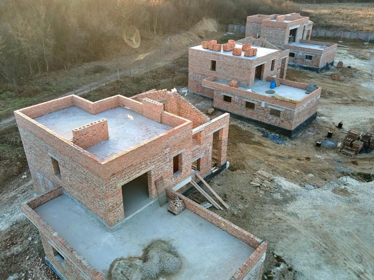 Illustration of Occupancy Certificate and Completion Certificate documents for a new home in Karnataka