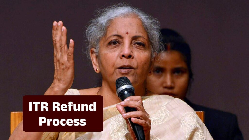 Person checking ITR refund status on mobile phone in Karnataka