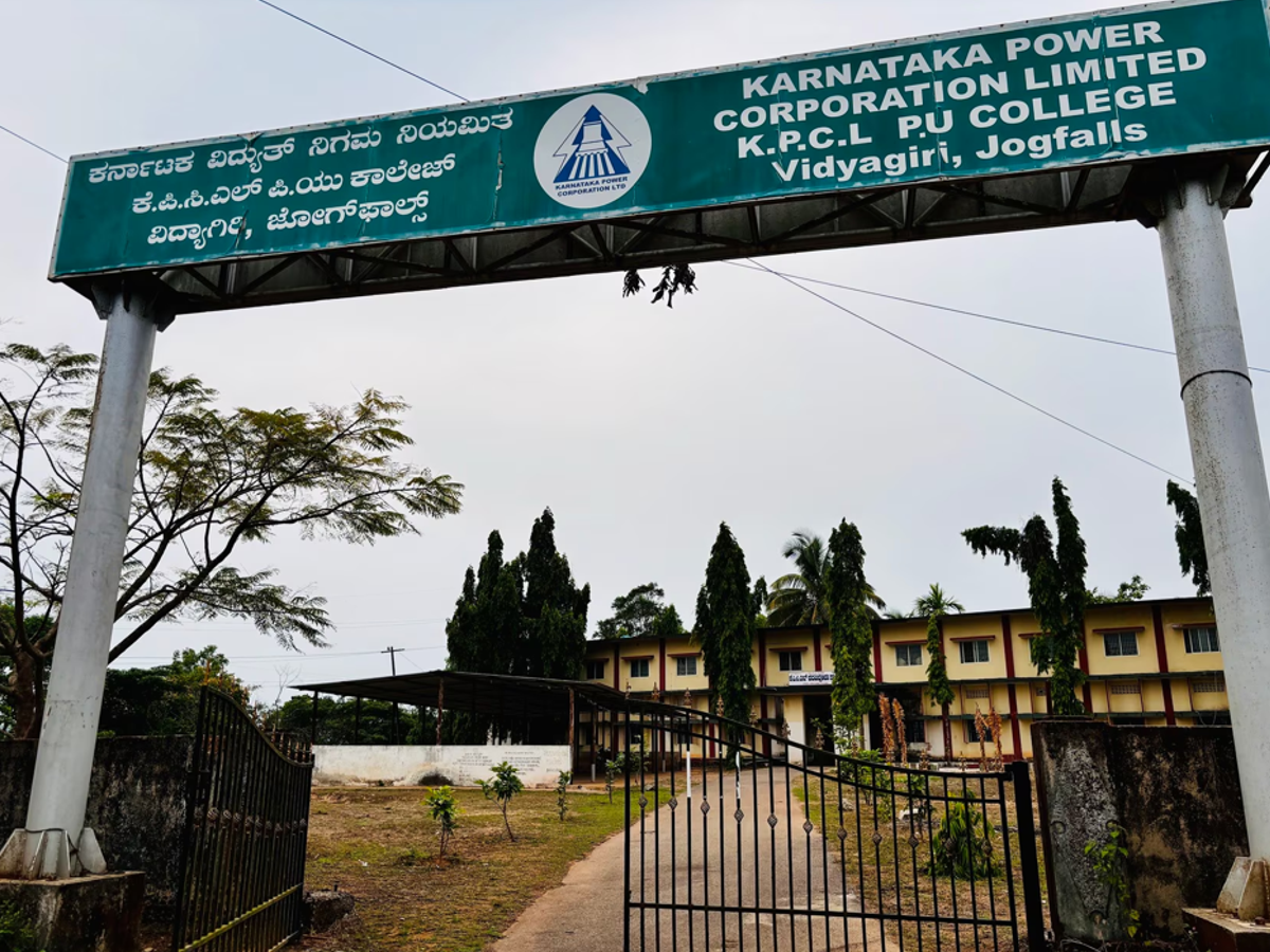 "Karnataka Power Corporation Limited (KPCL) building and employees illustrating power generation history"