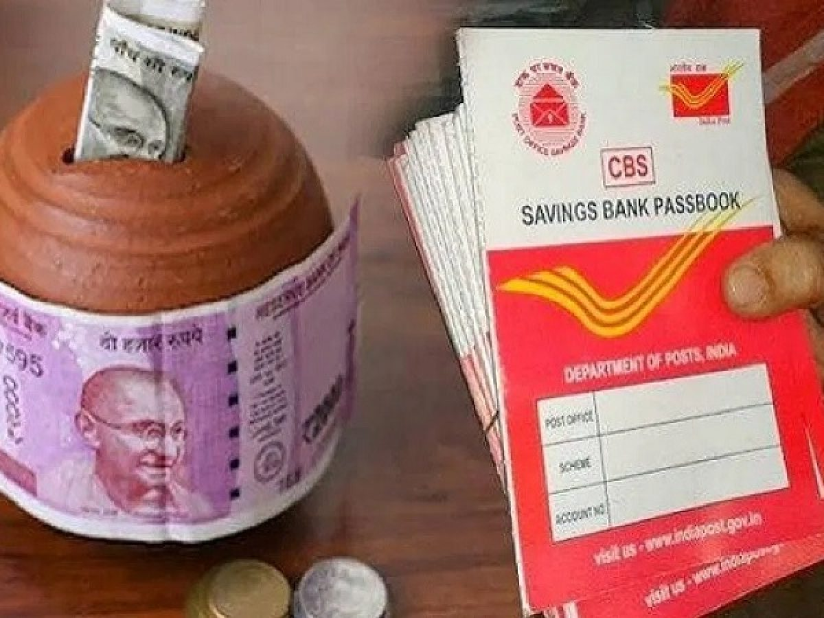 Person depositing money in Post Office RD account at a Karnataka post office
