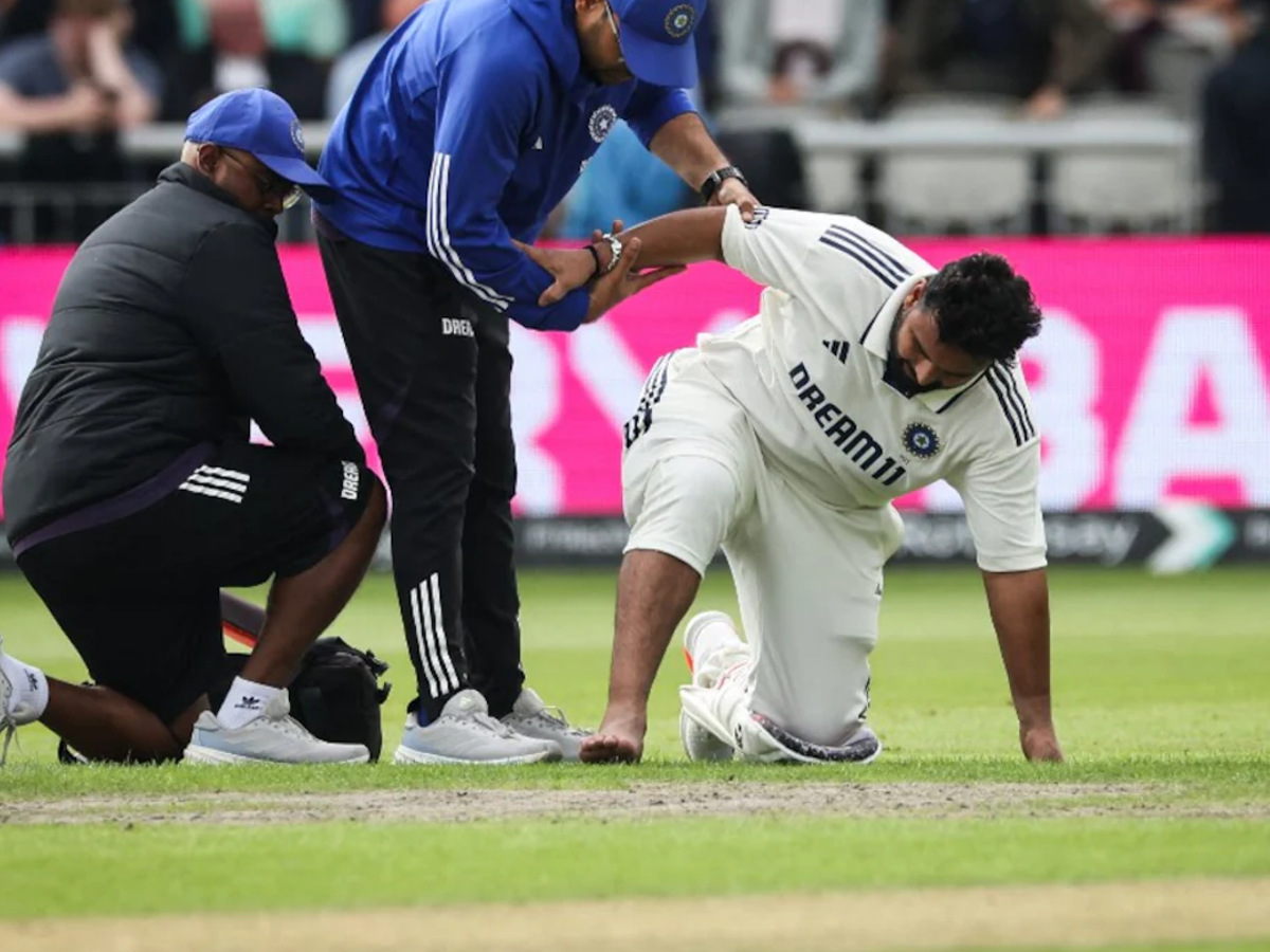Indian cricketer Rishabh Pant leaving the field on a golf cart after suffering a toe fracture during the fourth Test against England at Old Trafford.