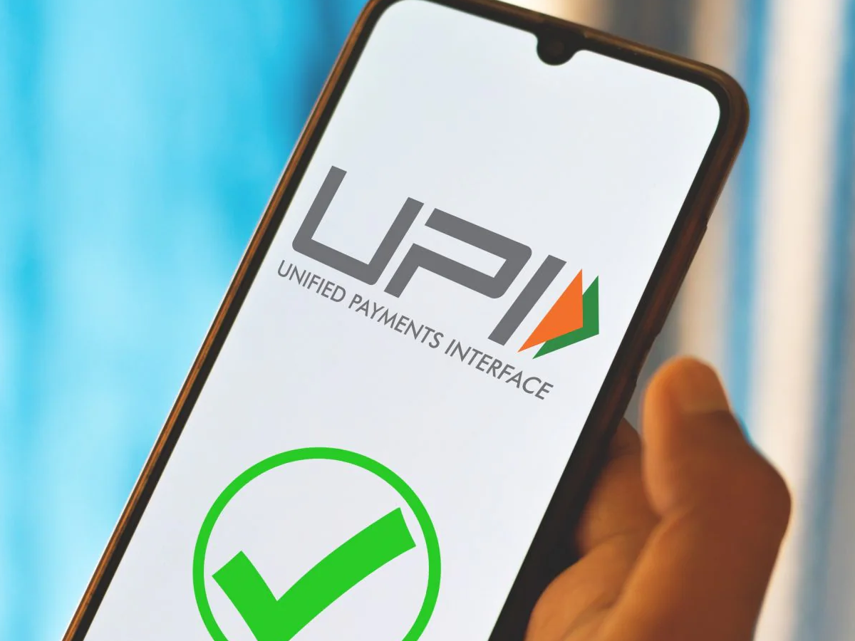 Illustration of UPI payment apps like PhonePe and Google Pay on a smartphone screen