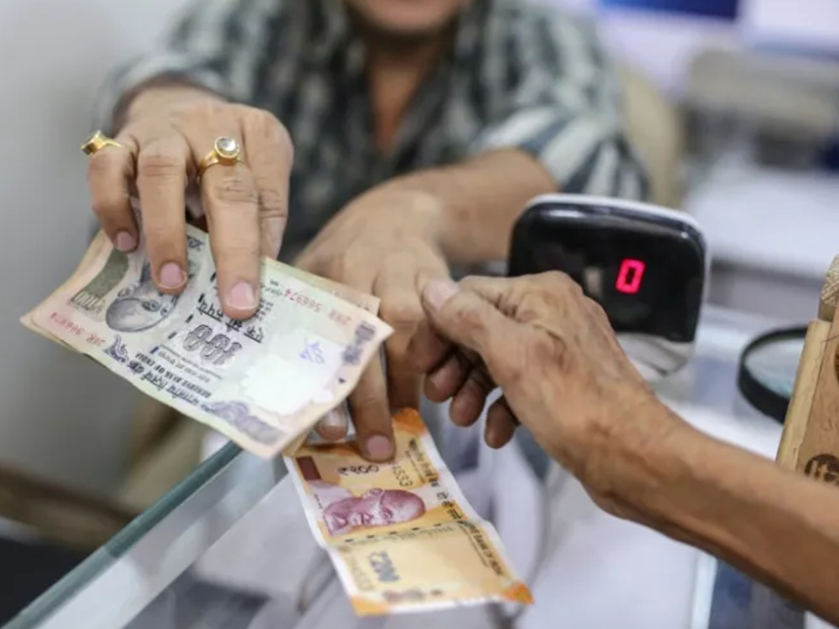KYC form and ID cards on table, depicting RBI's new KYC updates for 2025.