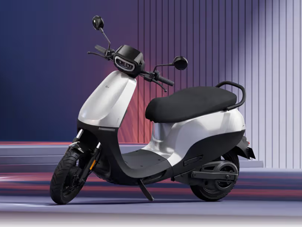 Ola S1X electric scooter in action on city roads, highlighting its stylish design and performance for 2025 budget commuters.