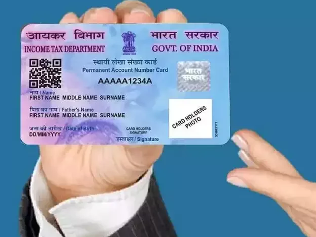 Person checking credit report on laptop for PAN card loan status