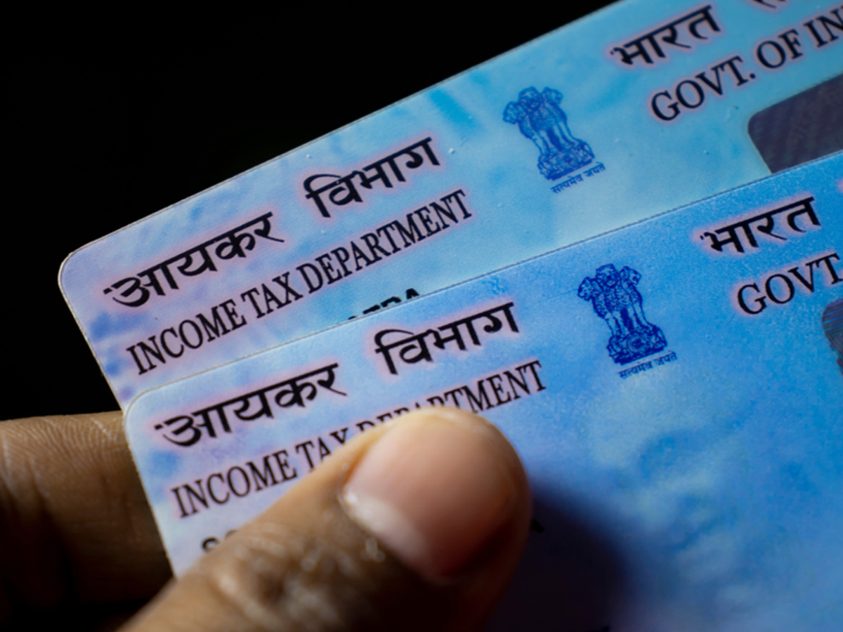 Secure PAN card with lock symbol representing fraud prevention tips.