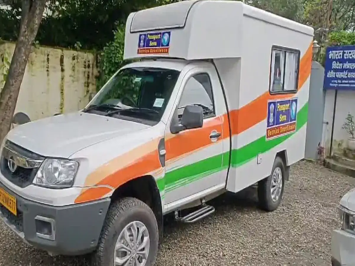 Mobile Passport Seva Van equipped with biometric devices and scanning equipment in a rural Northeast Indian village