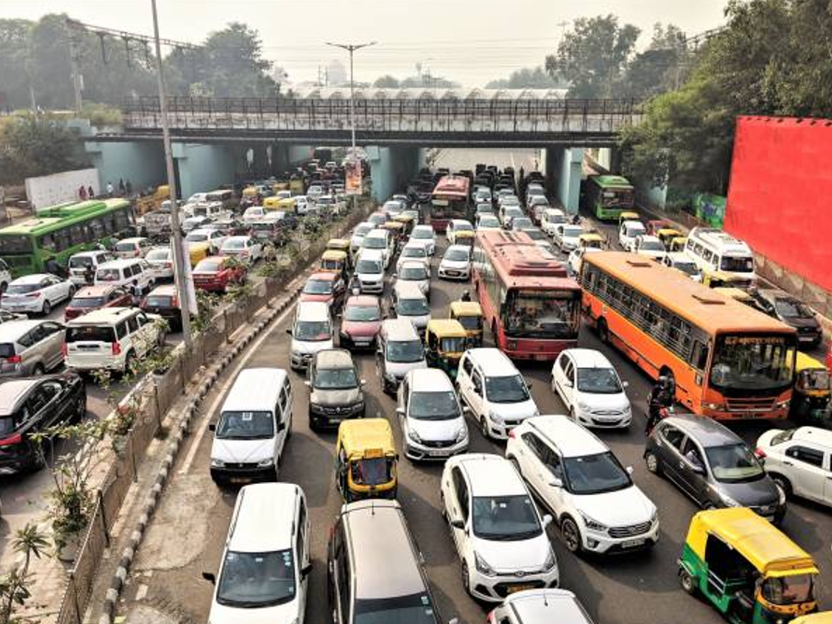 Bengaluru traffic with vehicles, showing potential impact of vehicle rules in Karnataka