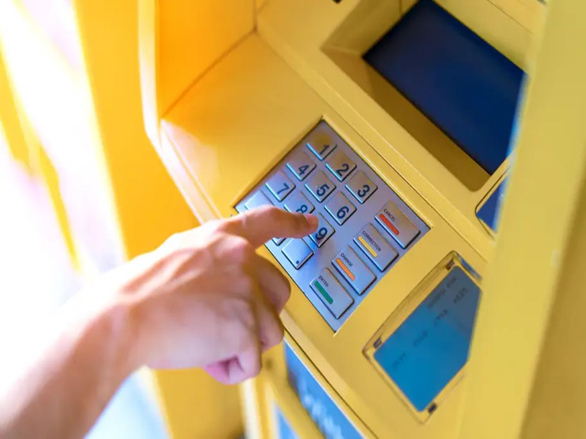 Person using a mobile banking app to check balance, highlighting digital banking alternatives.