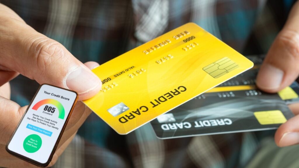Illustration of a credit card being cancelled with a graph showing credit score impact.