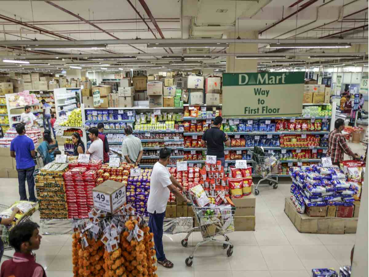 D-Mart store shelves stocked with discounted household and grocery items
