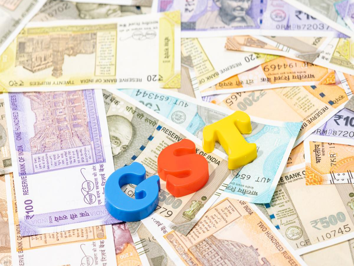 Photo of daily use items like clothes, medicines, and electronics with reduced prices due to GST slab changes.