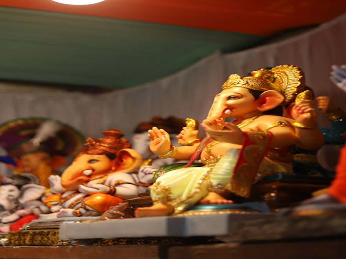 BBMP officials inspecting Ganesha idol preparation in Bengaluru.