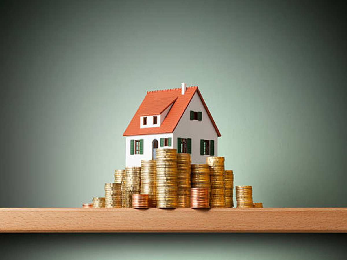 Illustration of a person calculating tax benefits for a housing loan under the new tax regime.