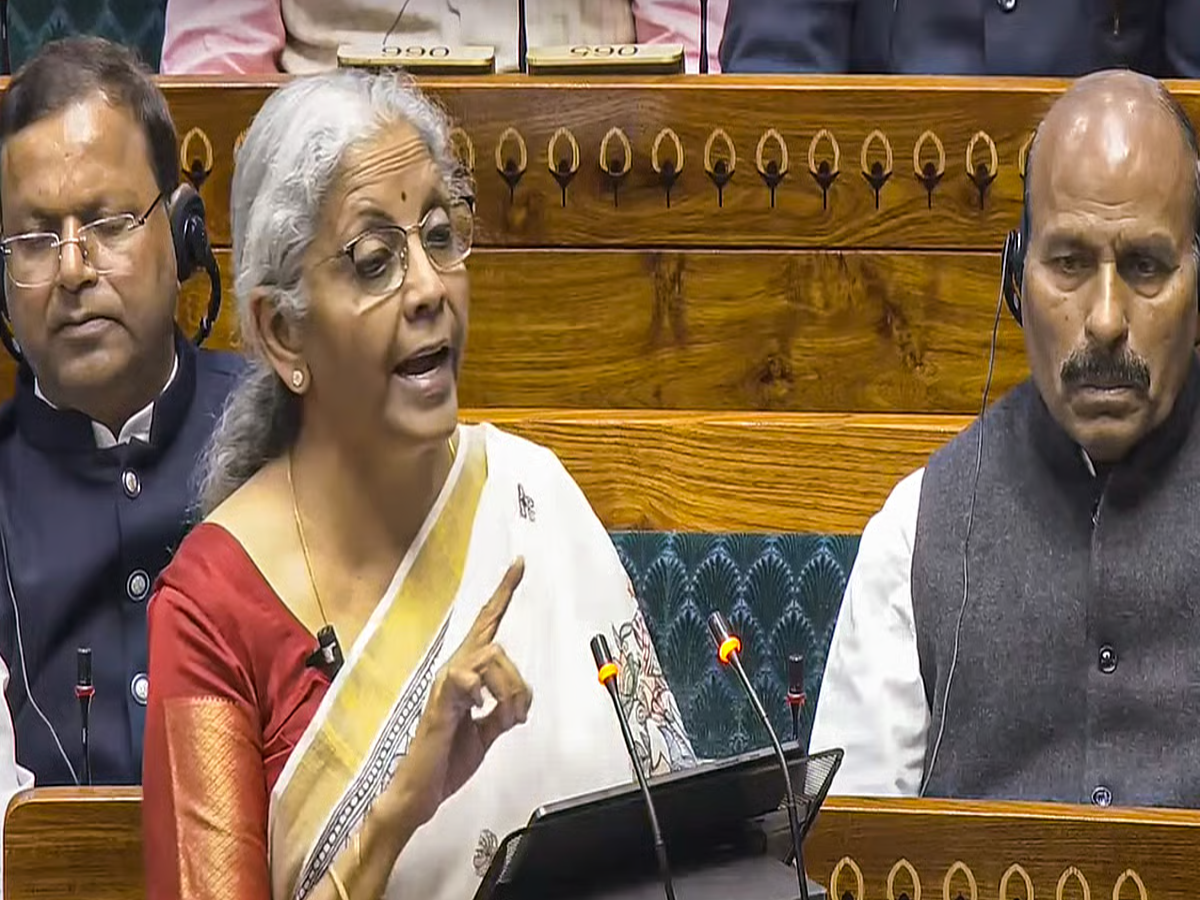 Indian budget 2025 document with income tax details, showcasing tax-free income up to 12.75 lakh