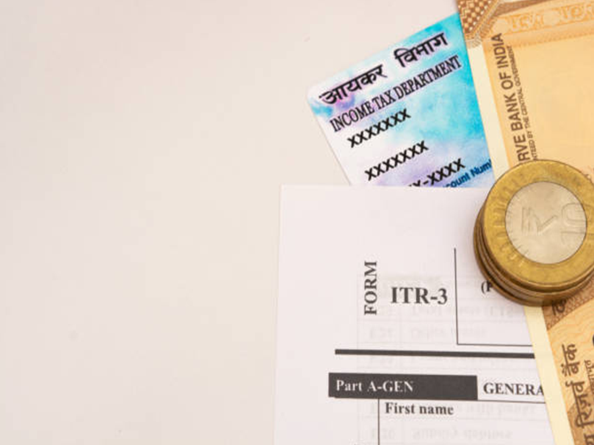 Financial documents and calculator for ITR filing by homemaker