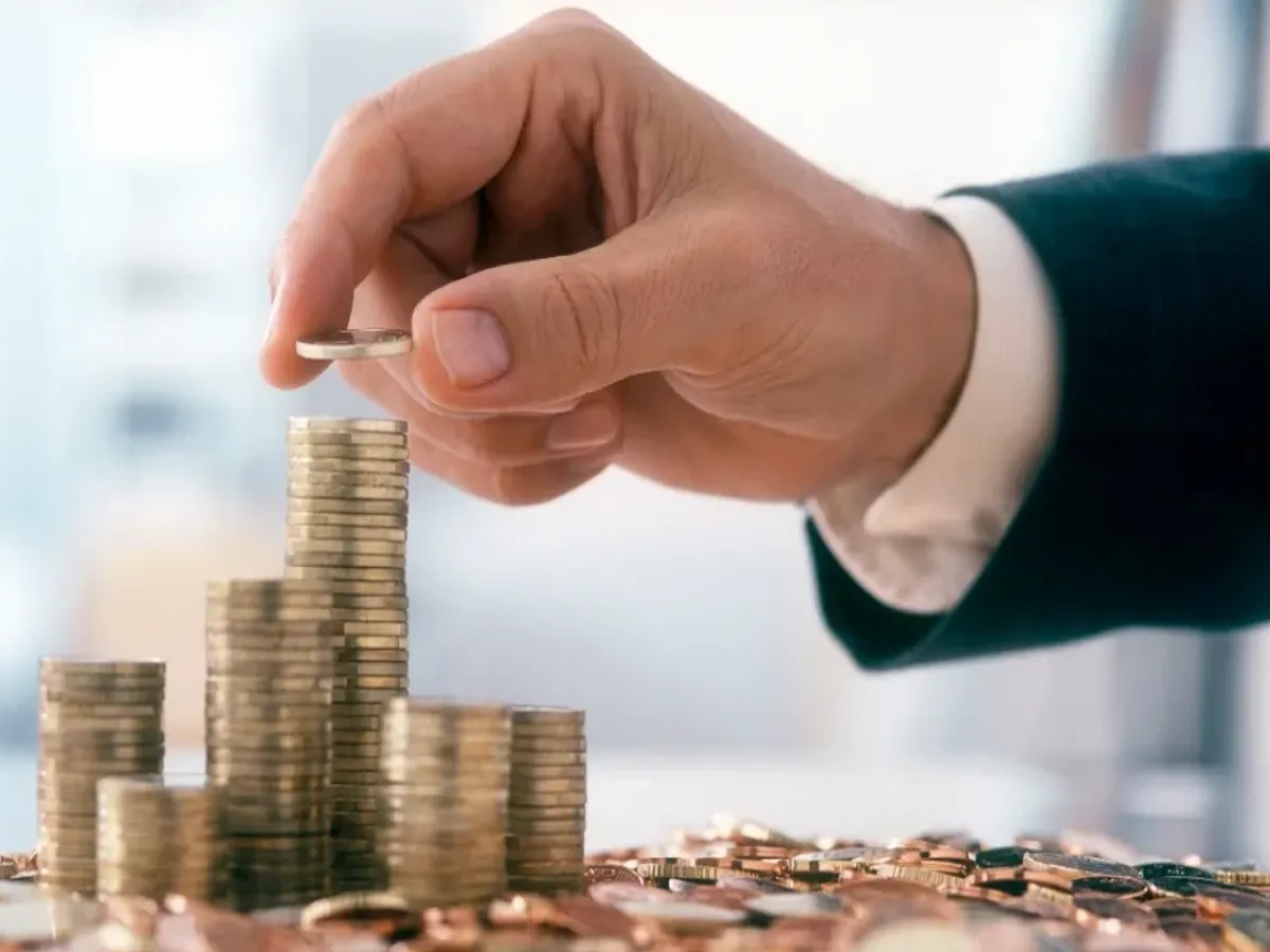 Image of a person reading a loan agreement, emphasizing the importance of understanding terms.