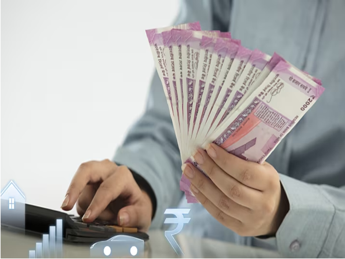 Illustration of a person reviewing loan documents with a bank officer, representing loan top-up discussions.