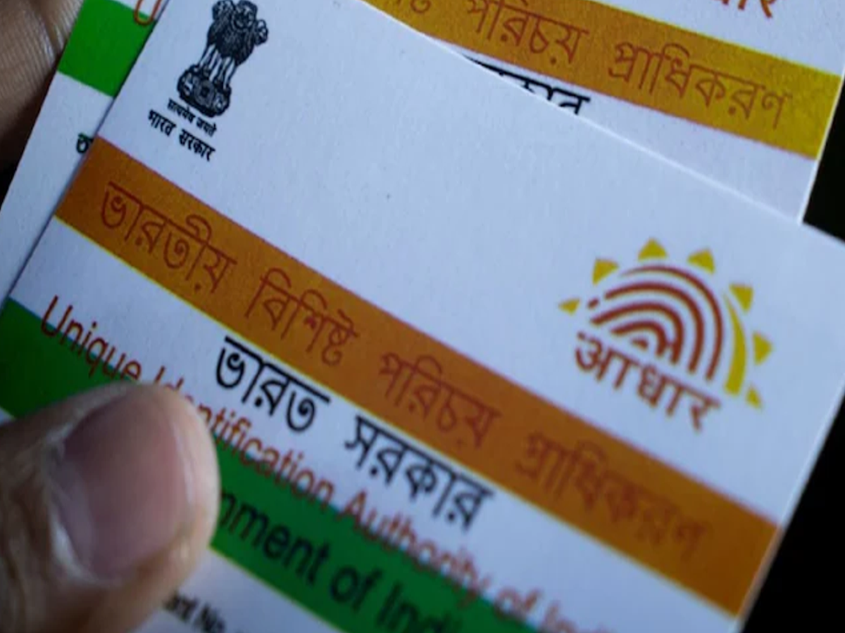mAadhaar mobile app interface showcasing Aadhaar card services.