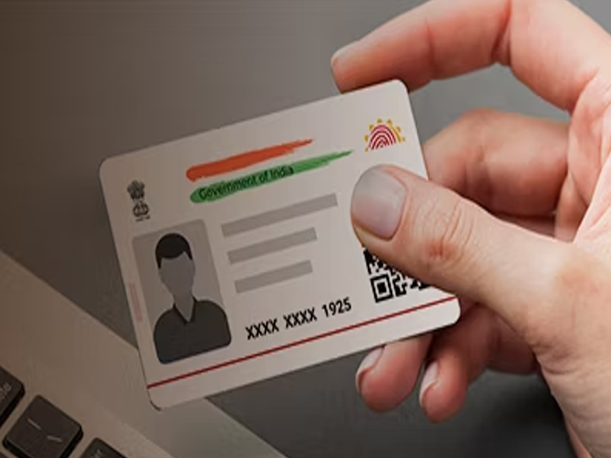 Illustration of a masked Aadhaar card showing only the last four digits for enhanced security.