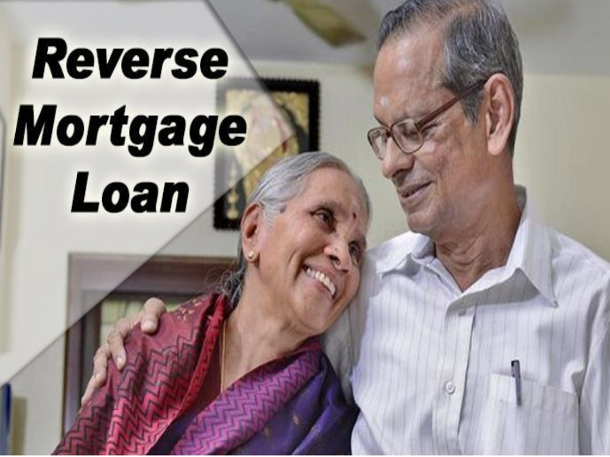 Senior citizen receiving reverse mortgage loan benefits from a bank