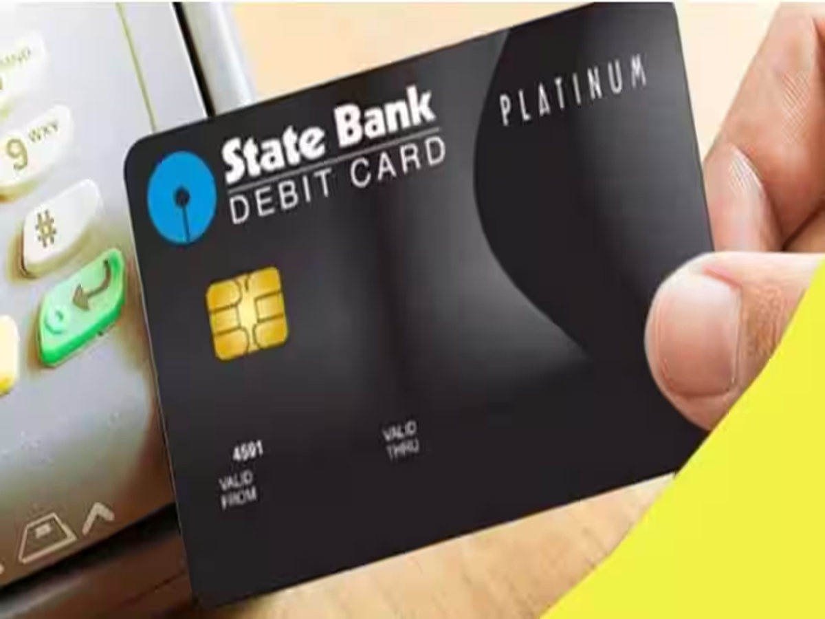 Close-up of an SBI Gold debit card highlighting issuance and maintenance fees.
