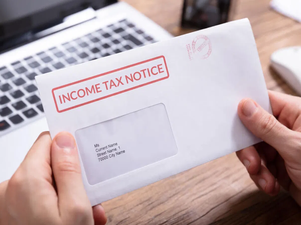 Illustration of a joint bank account passbook with a tax notice, highlighting financial regulations.