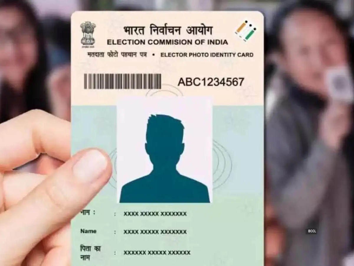 Person accessing ECI website on laptop for Voter ID cancellation process in 2025.