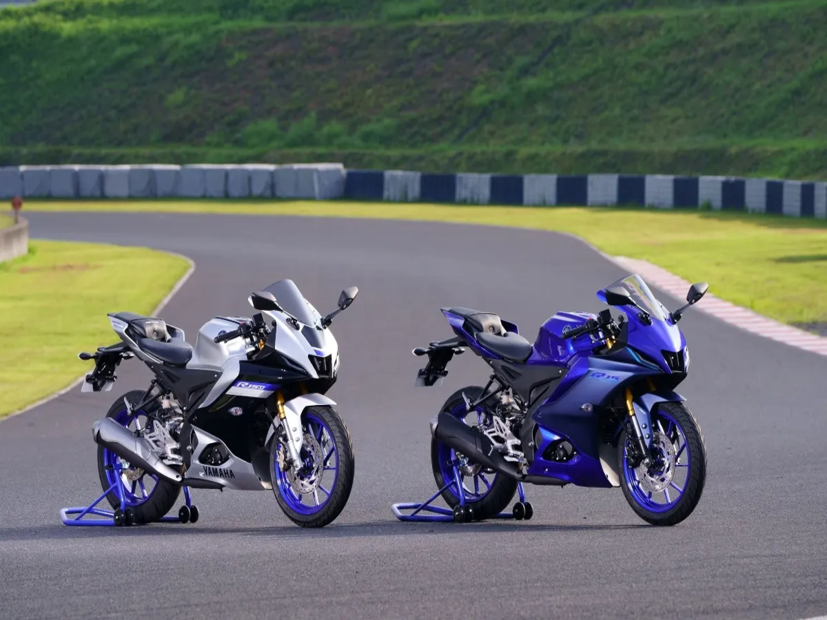 Yamaha R15 V4 sports bike in action on a city road, showcasing its sleek design and vibrant colors.