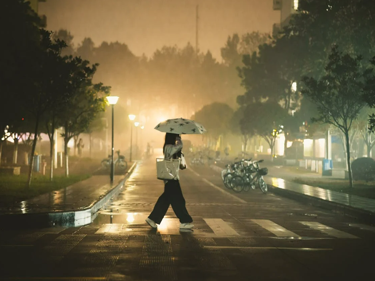 Rainfall in Karnataka with flooded roads and yellow alert warning for 16 districts in August 2025