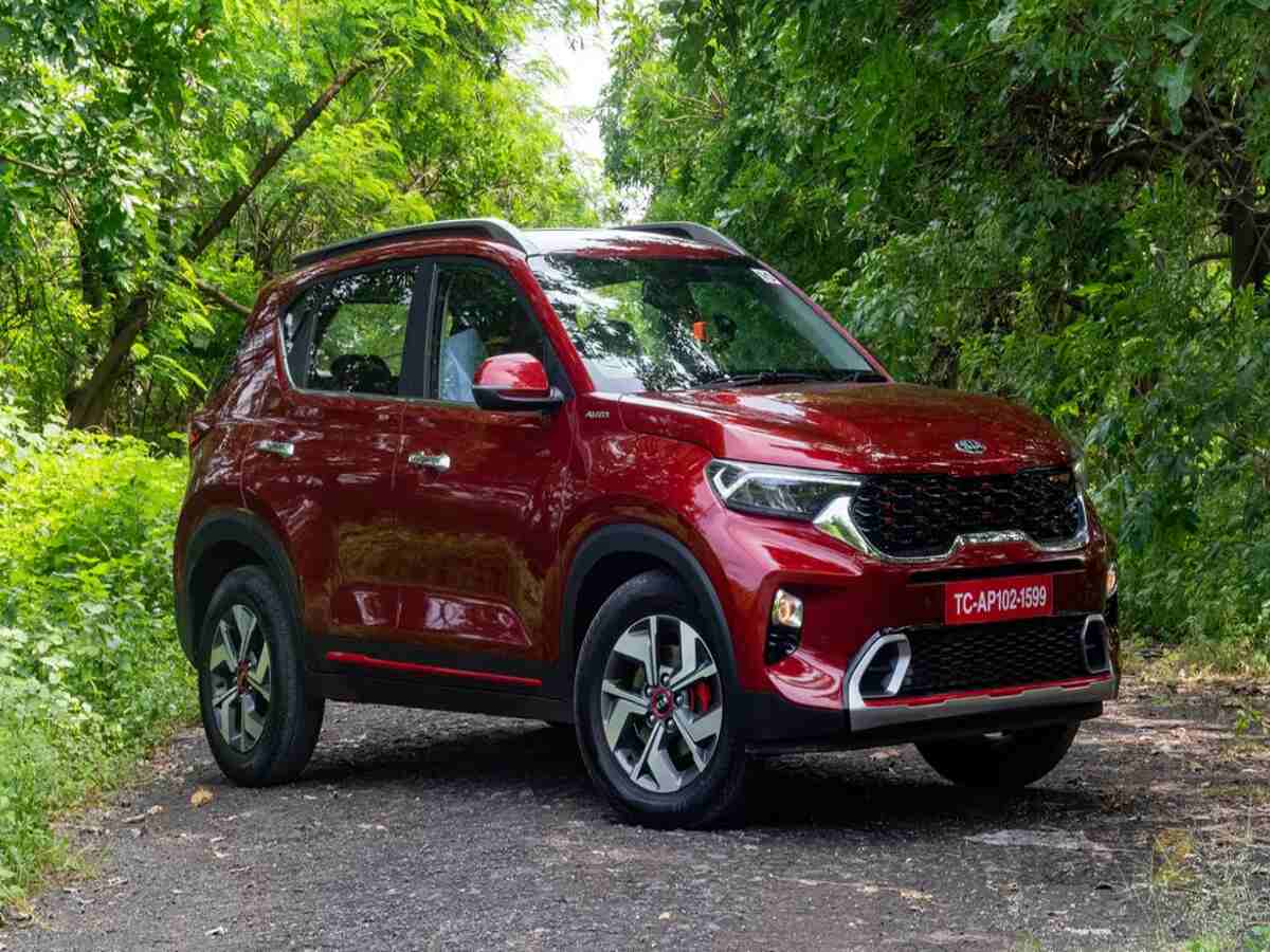 Kia Sonet on a city road demonstrating its smooth performance and stylish look.