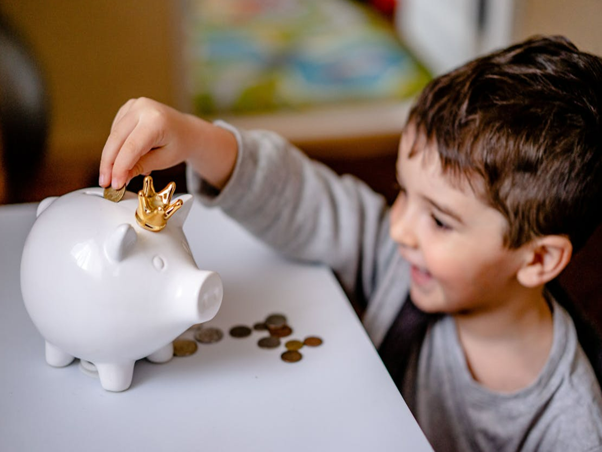 Illustration of a piggy bank with growing coins, representing SIP investment growth.
