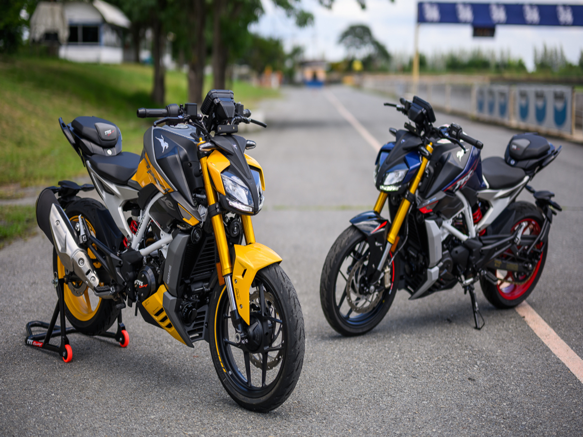 TVS Apache RR 310 on a racetrack, displaying its powerful stance and BMW-engineered design.