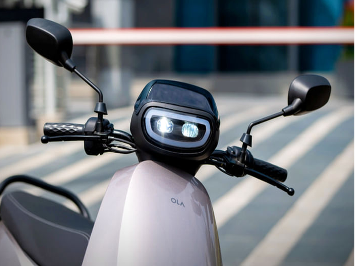 Ola S1 Pro Gen 3 and Ather 450 Apex scooters parked side by side, showcasing their sleek designs.