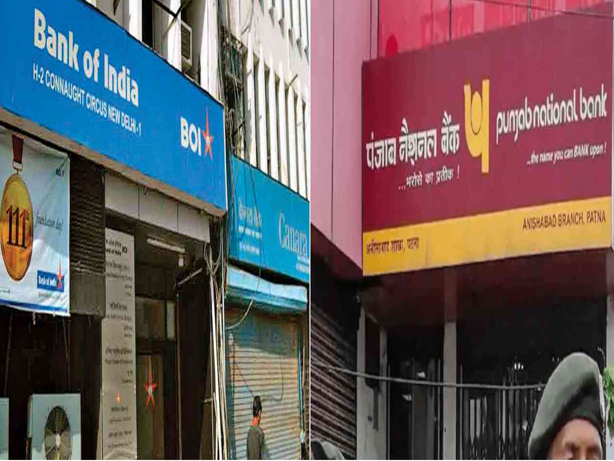 A person signing loan documents with PNB and BoI logos, symbolizing reduced loan interest rates for customers.