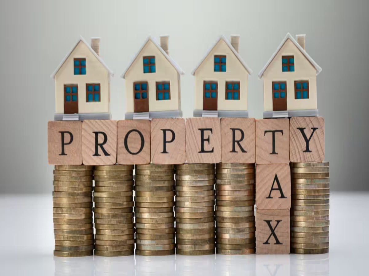 Person using laptop to pay property tax online, showcasing digital payment convenience