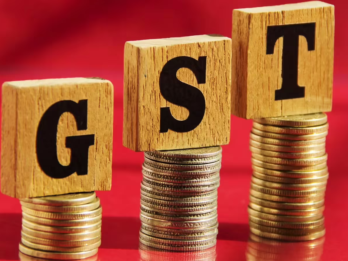 Illustration of GST tax slabs with 5% and 18% rates for daily essentials