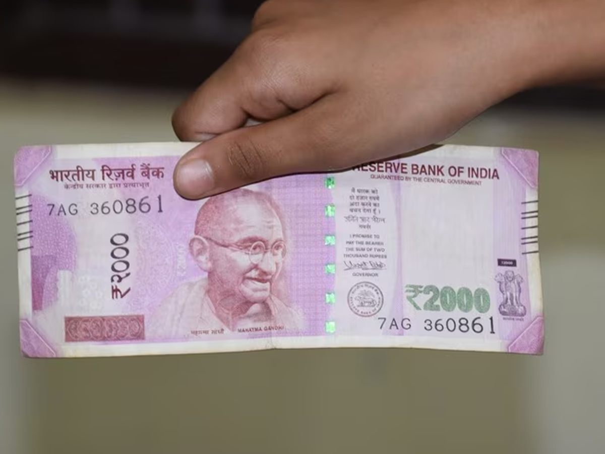 Stack of 2000 rupee notes with RBI logo for currency update